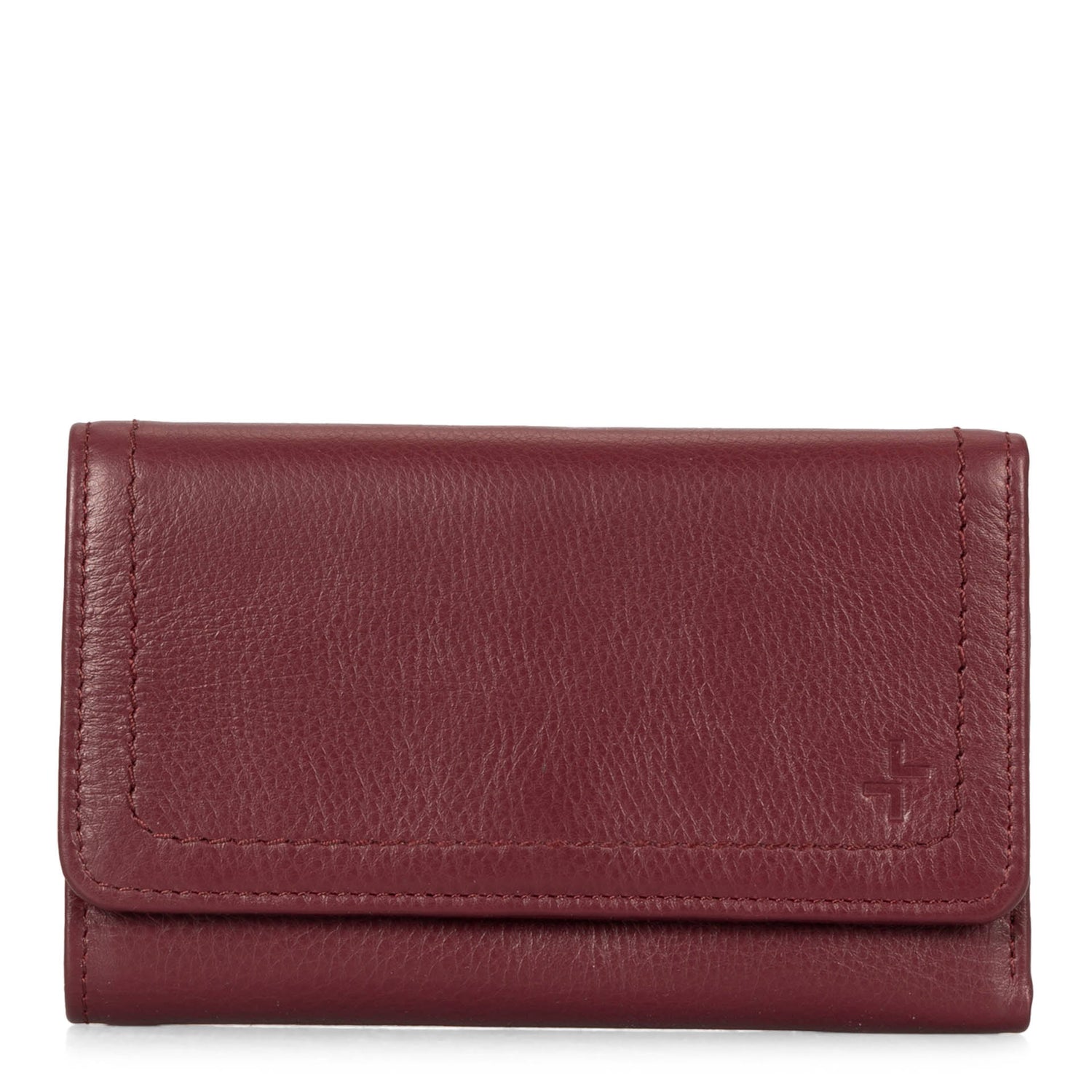 Front side of a burgundy flap wallet for women called Kara designed by Tracker showing its logo and soft leather.