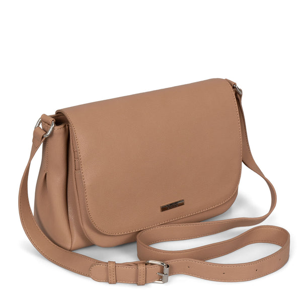 Angle view of a bag called Flap Crossbody Bag with a white background, showcasing its shoulder strap - bentley