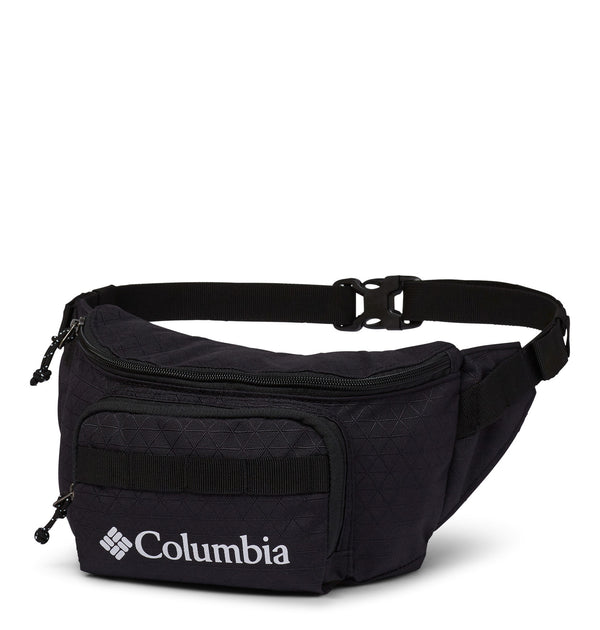 Angle view of a black fanny pack called Zig Zag designed by Columbia showing its belt strap and logo printed in the front.