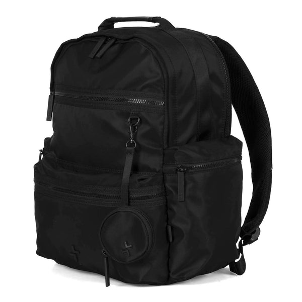 Angle view of a black backpack called Sutton by Tracker, showcasing its 2 front zipper pockets, an ear pod pouch, top handle and 1 adjustable and padded strap.